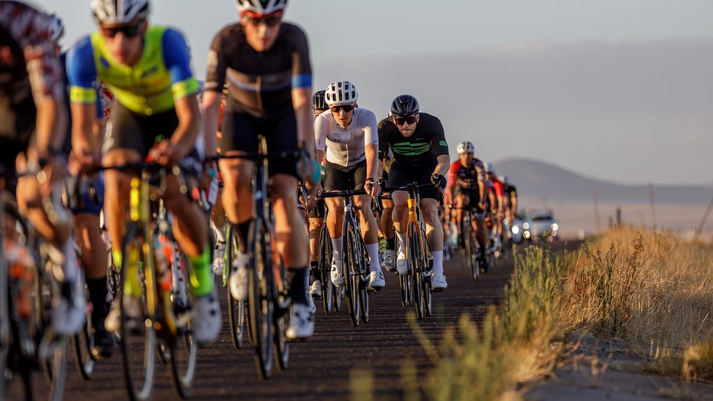 Cyclists on the 99er Cycle Tour route riding on the road