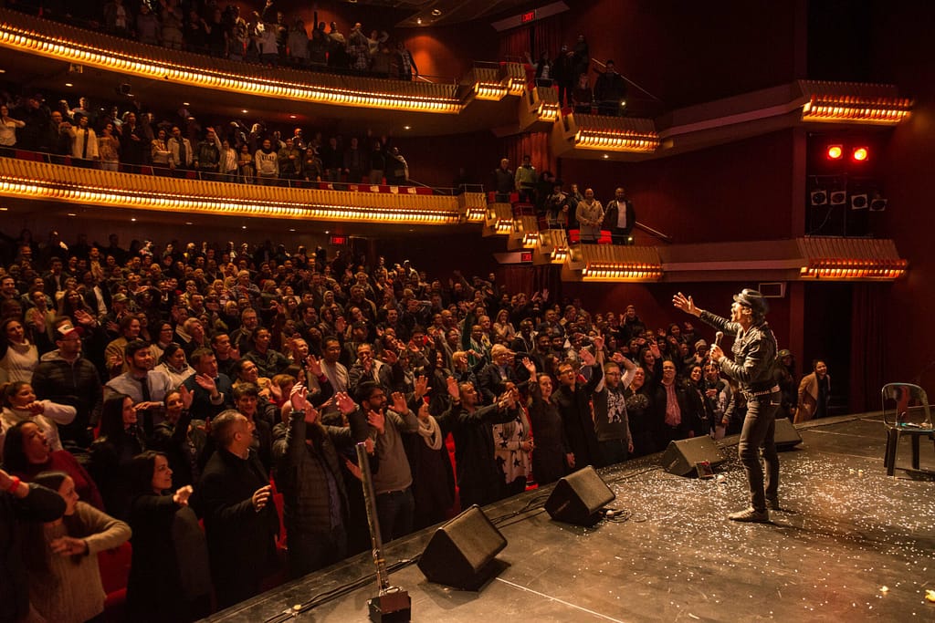 Funny Festival audience standing at Baxter Theatre