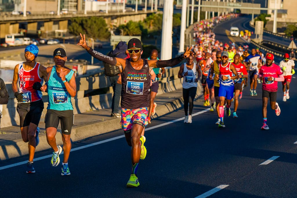Cape Town Marathon runners on the freeway