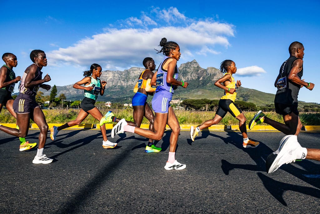Cape Town Marathon elite runners in Rondebosch with Devil's peak as backdrop