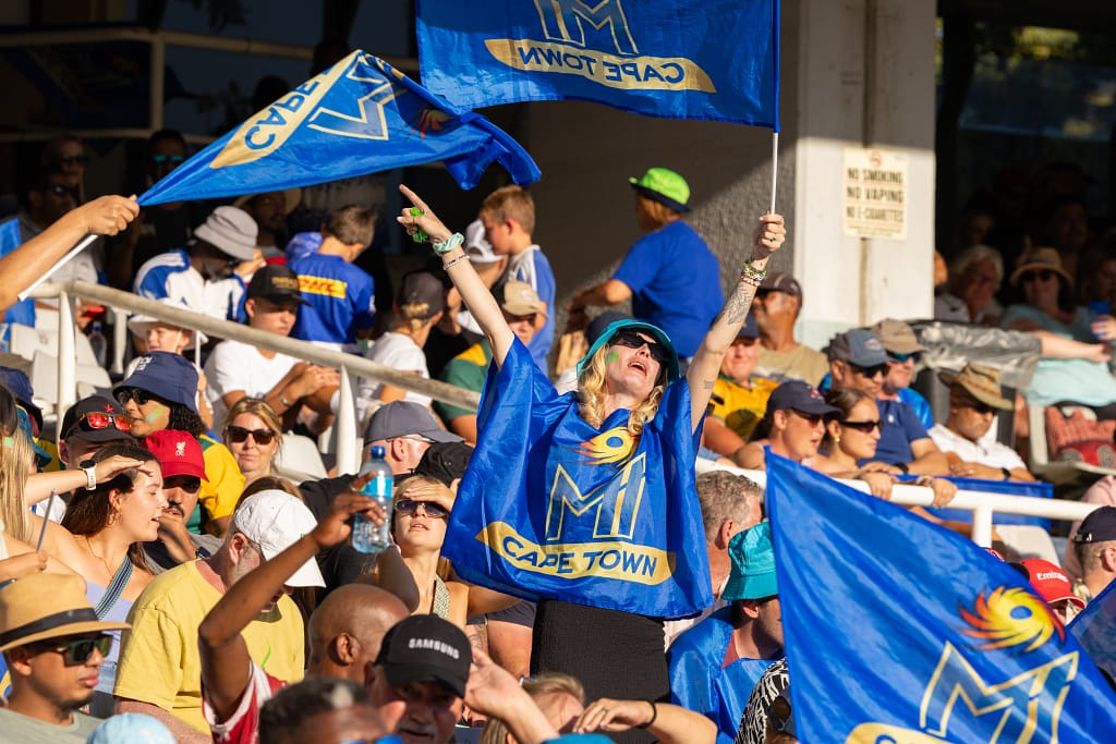 Mi Cape Town fans in the stands with team blue and gold flags