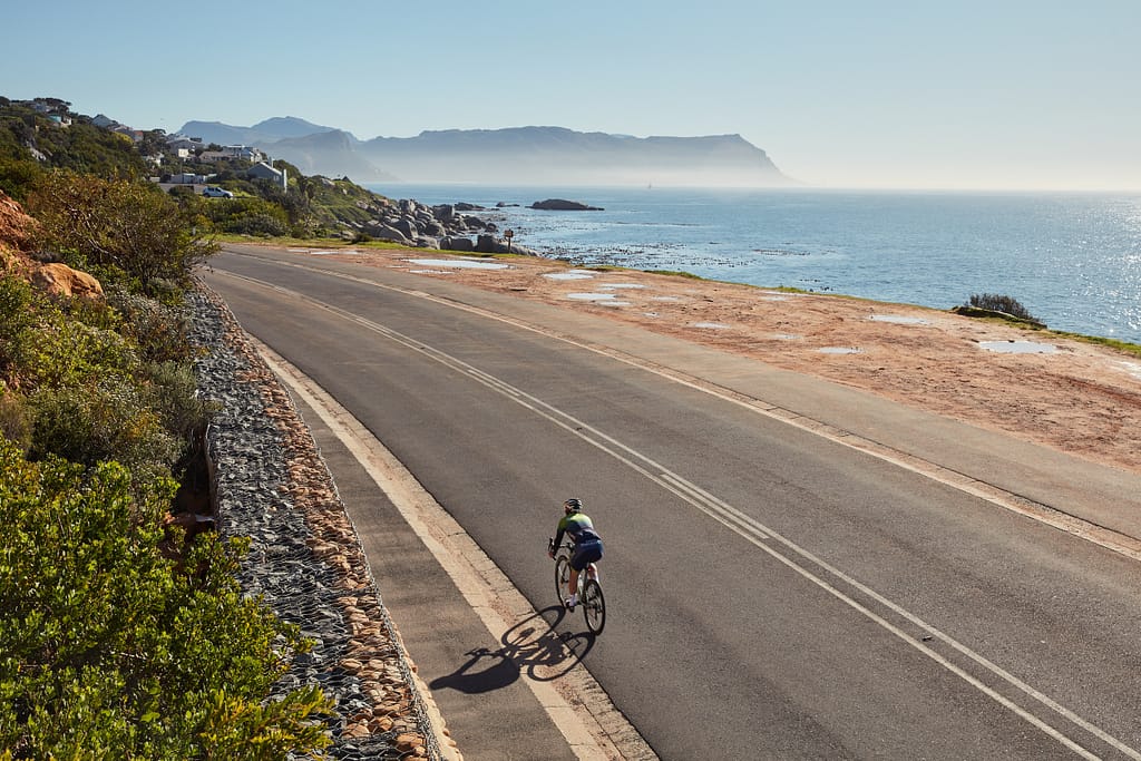 A cyclist rides in Simon’s Town, one of South Africa’s oldest and most picturesque towns, set to host the Cape Point Triathlon