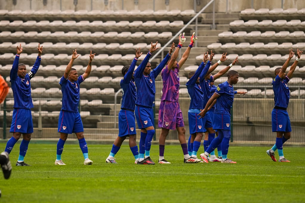 Hope FC players greet their fans ahead of a game in Athlone Stadium