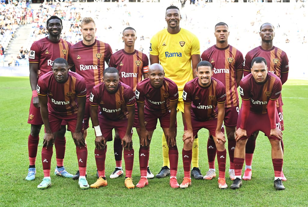 Stellenbosch FC players pose for a team before a match at DHL STadium