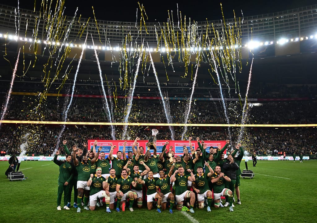 Springbok players lift the Freedom Cup in Cape Town after a win against New Zealand at DHL Stadium in 2024