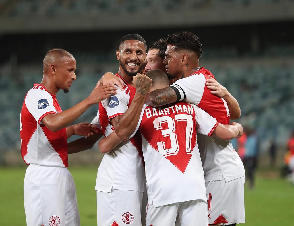 Cape Town Spurs players celebrating after scoring