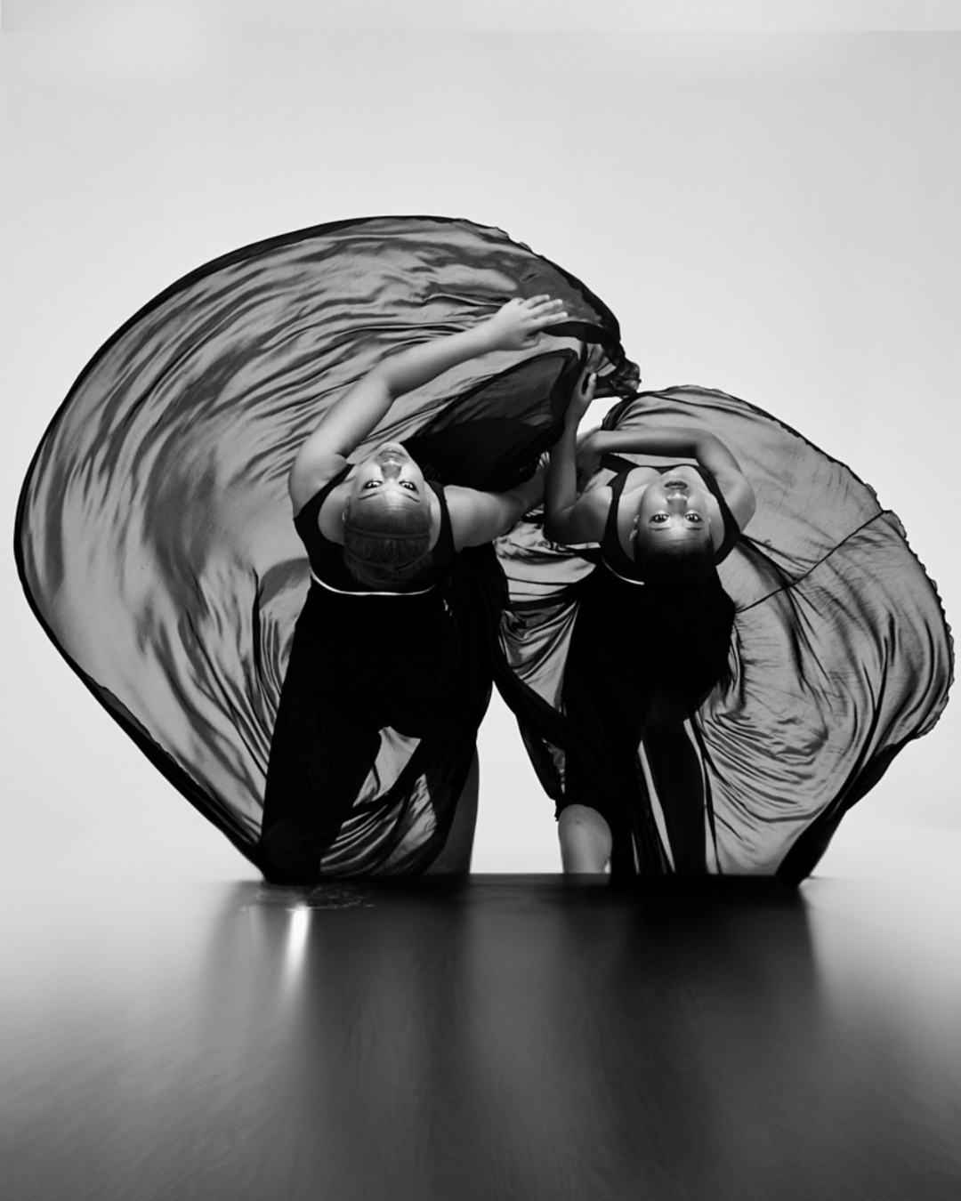 Black and white image of dancers in studio