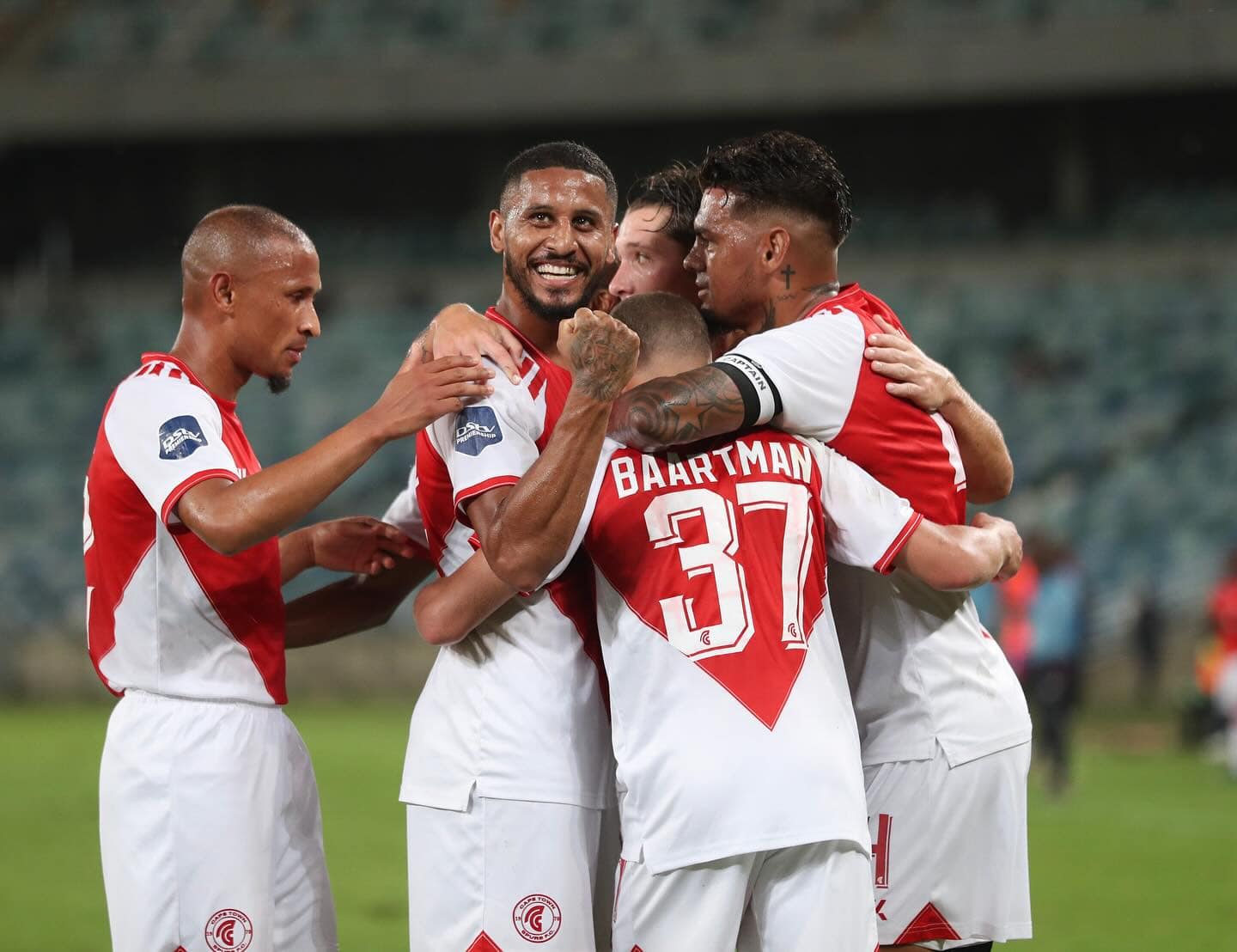 Cape Town Spurs players celebrating after scoring
