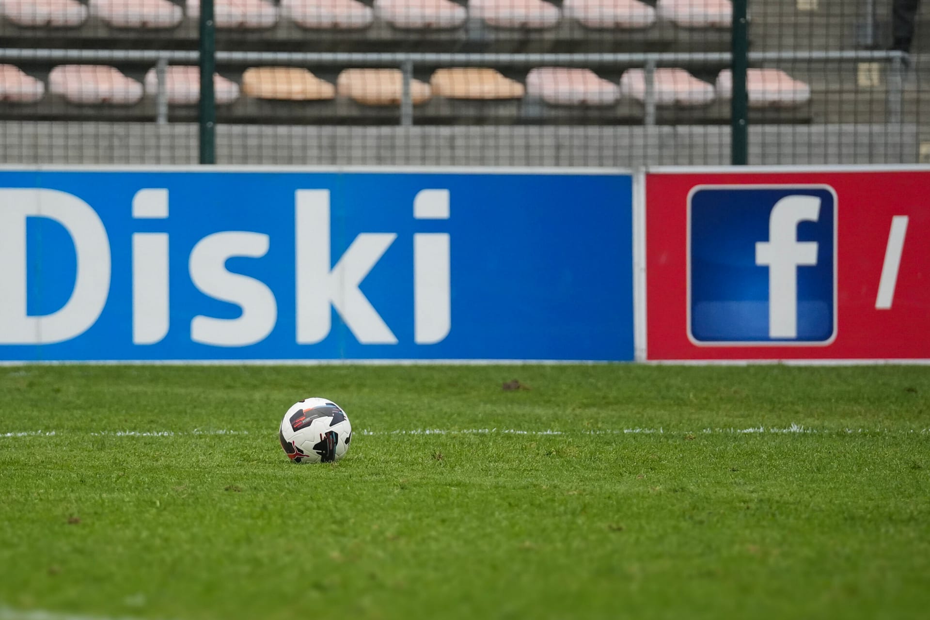 A football on the pitch at Athlone Stadium, homeground for Hope FC and Cape Town City FC