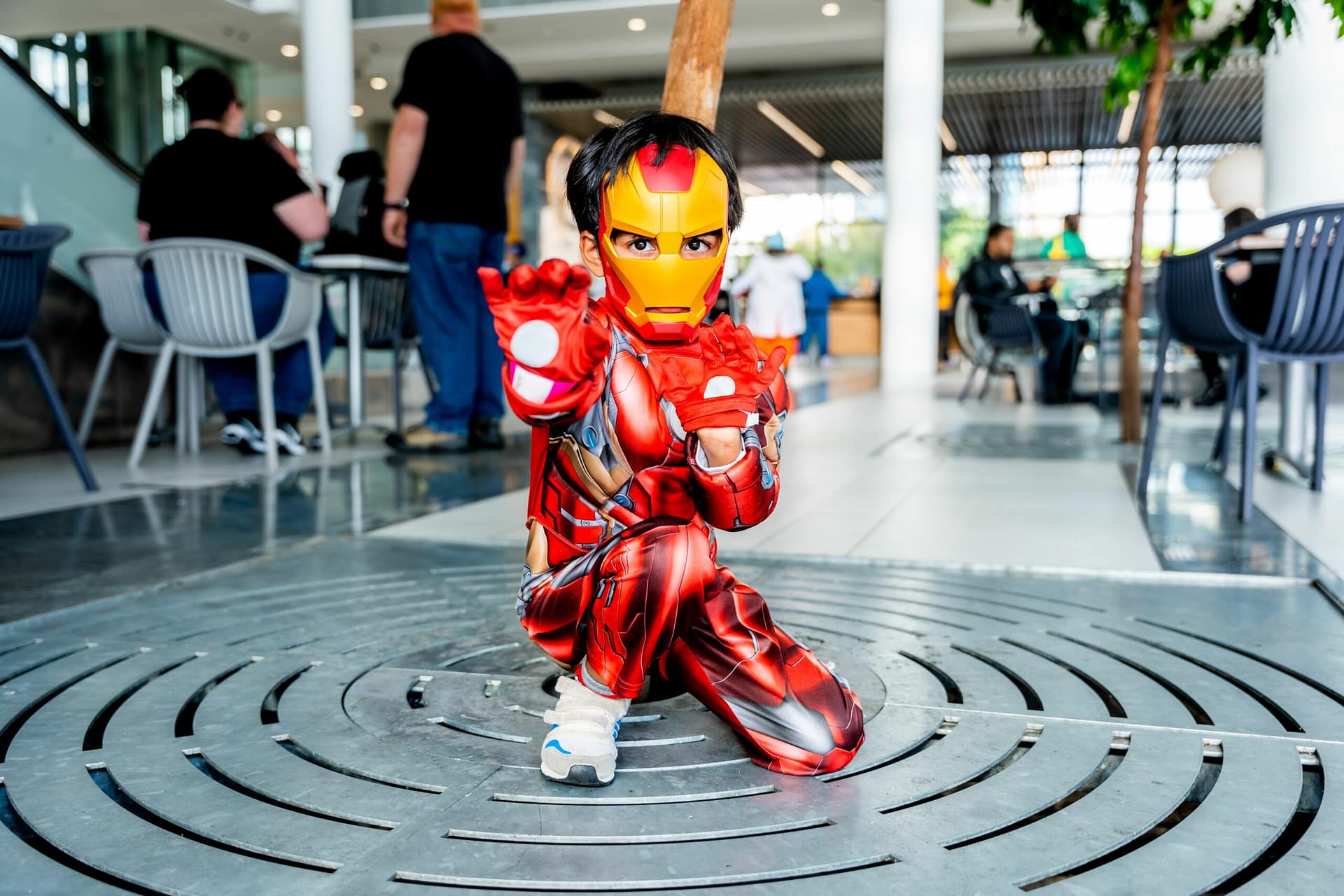 Kid dressed up as Iron Man superhero at First Comic Con Cape Town event