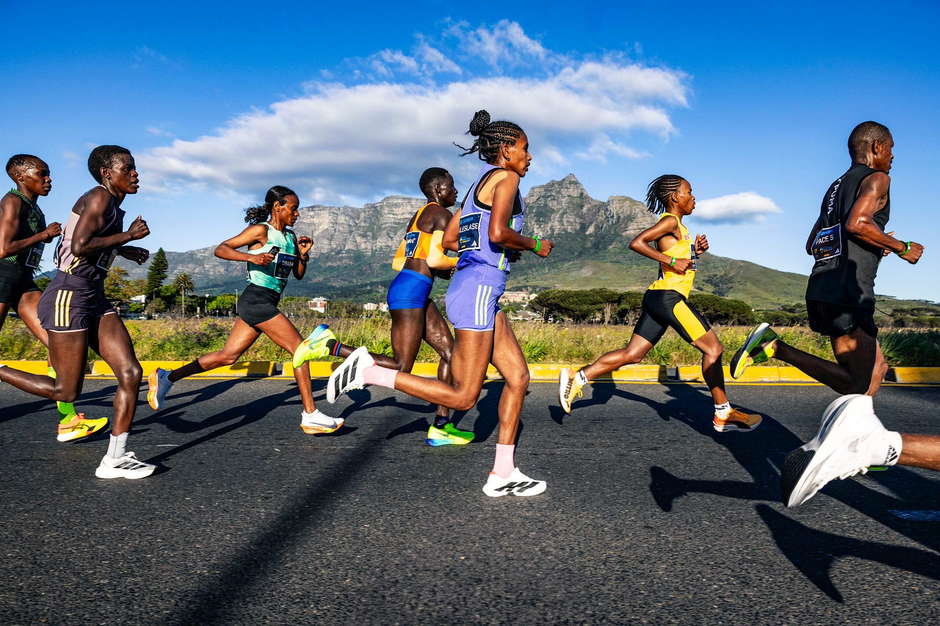 Cape Town Marathon elite runners in Rondebosch with Devil's peak as backdrop