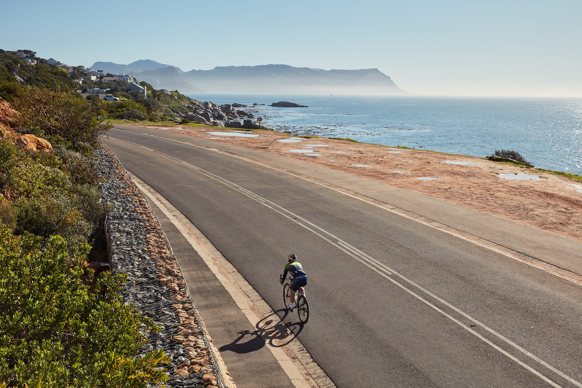 A cyclist rides in Simon’s Town, one of South Africa’s oldest and most picturesque towns, set to host the Cape Point Triathlon