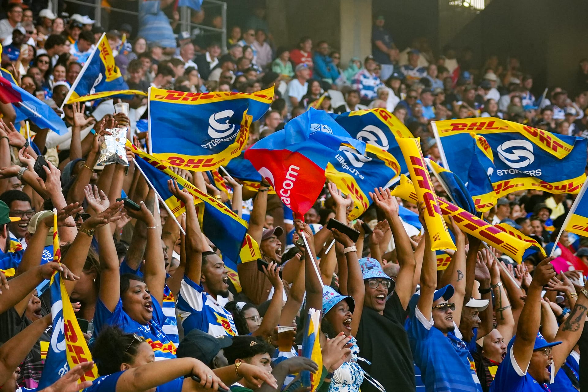 DHL Stormers fans take part in the Mexican wave during a game