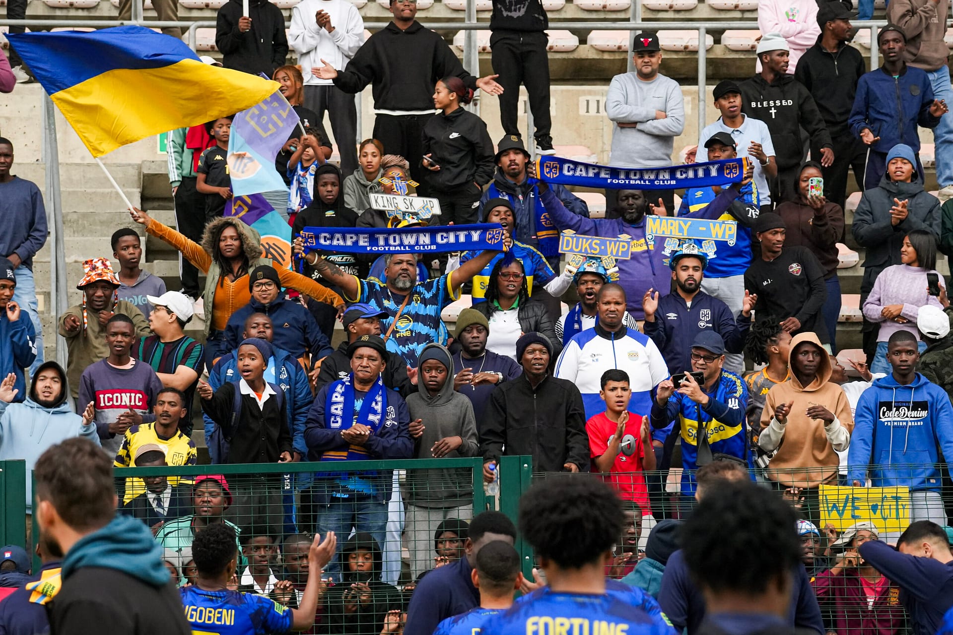 Cape Town City fans applaud team players after a game at Athlone Stadium. They host The Bees in Athlone in October