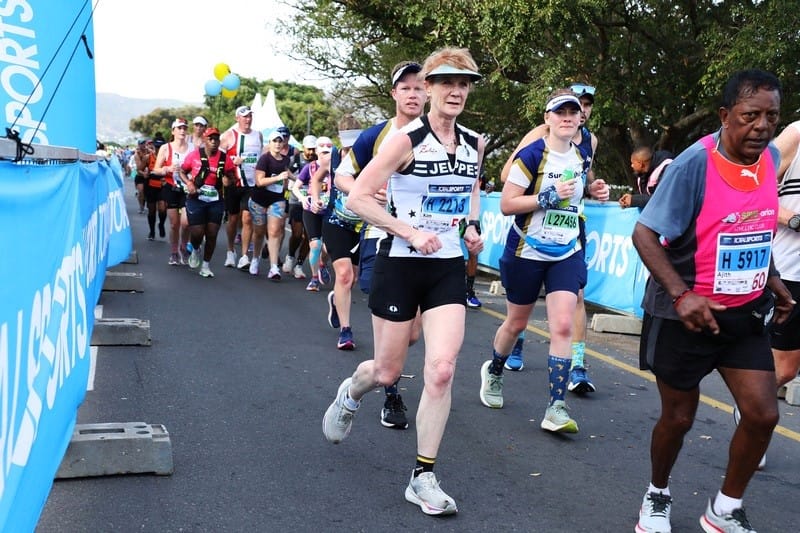 Kim Pain, whose Two Oceans Marathon journey spans four decades, is one of 11 people chasing the Triple Blue Number status on 11 April 2026.