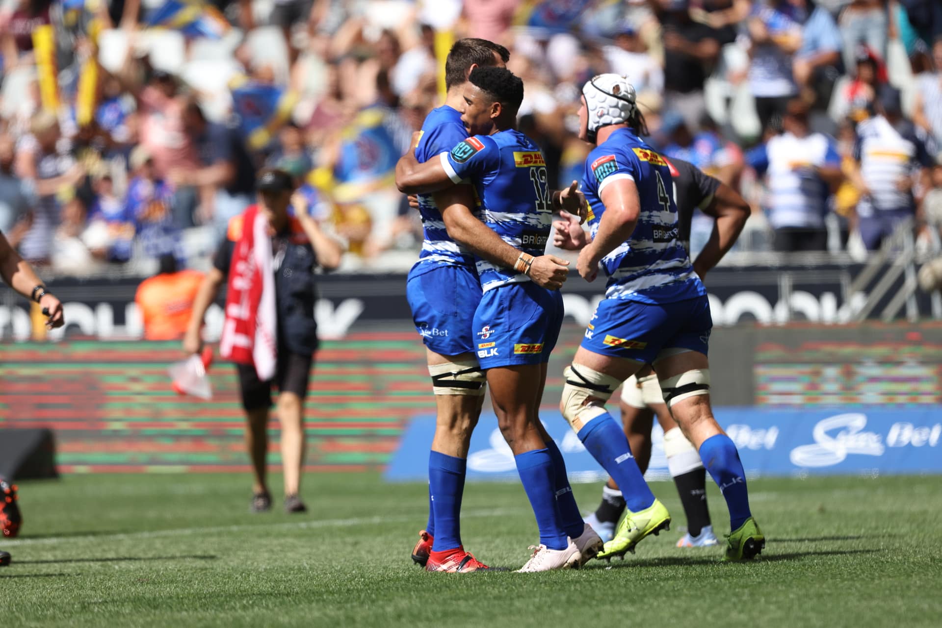 DHL Stormers players hug each other during a URC game